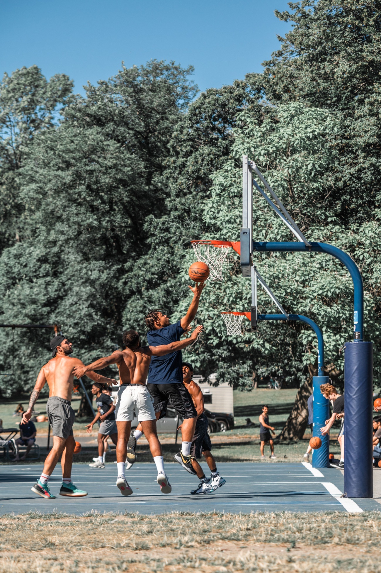 Outdoor park pickup basketball game